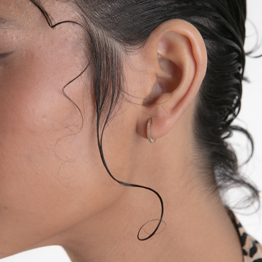 Piercing Persa con diamante champagne